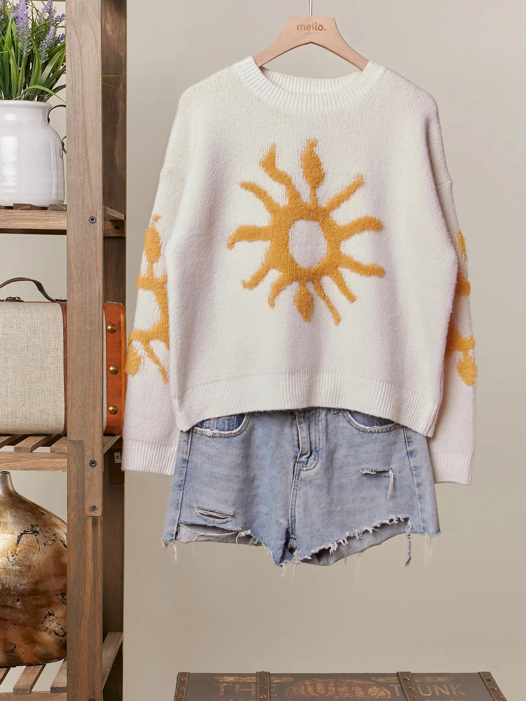 Cozy Knit Sweater with Bold Yellow Sun Patch