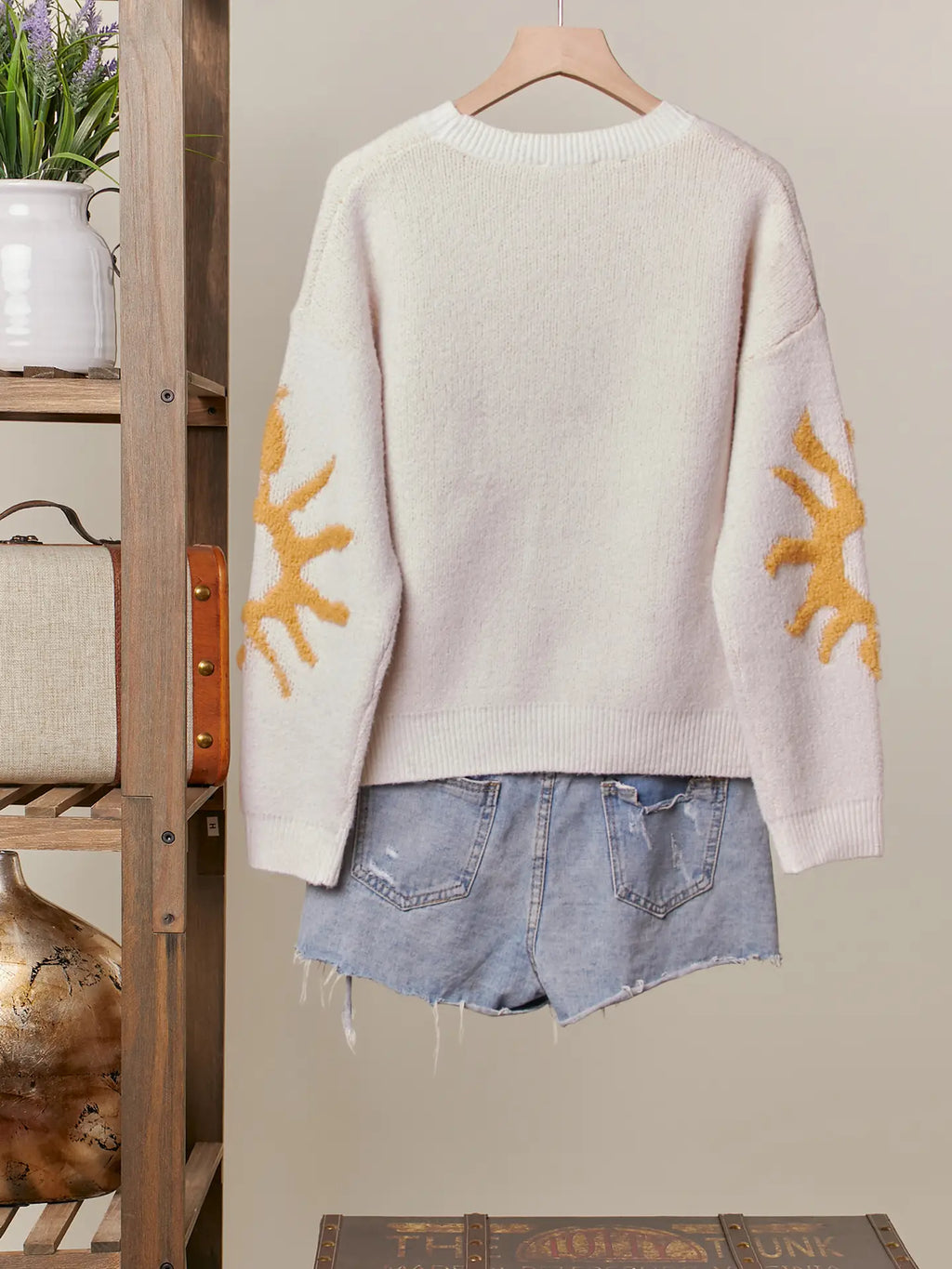 Cozy Knit Sweater with Bold Yellow Sun Patch